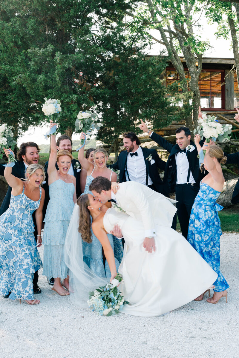 Newport Wedding Photographer | Rhode Island Caprio Captured Photography | Bride in Stunning Floor-Length Veil Holding A White Bouquet