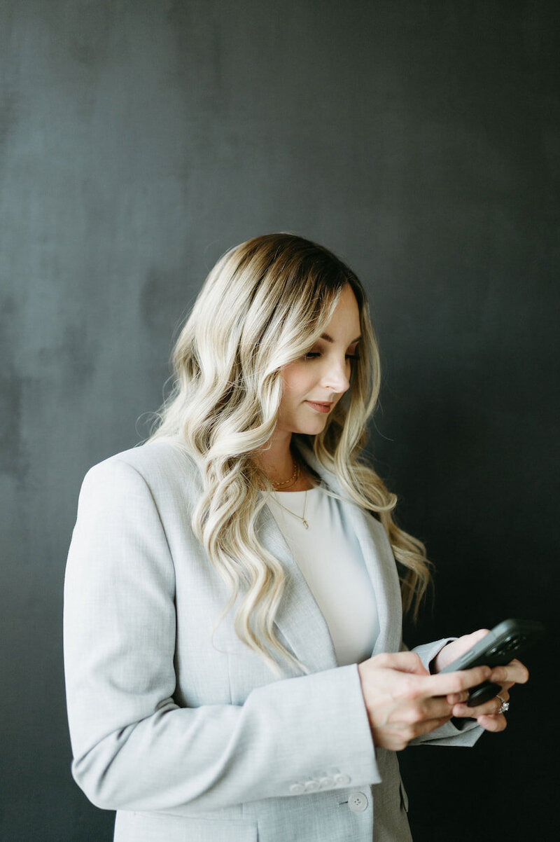 Karly Whitaker, HoneyBook expert and systems strategist, assisting creative business owners with client management solutions using the HoneyBook CRM.