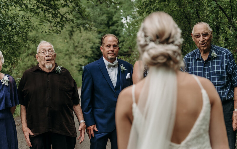 grandfather looking at bride