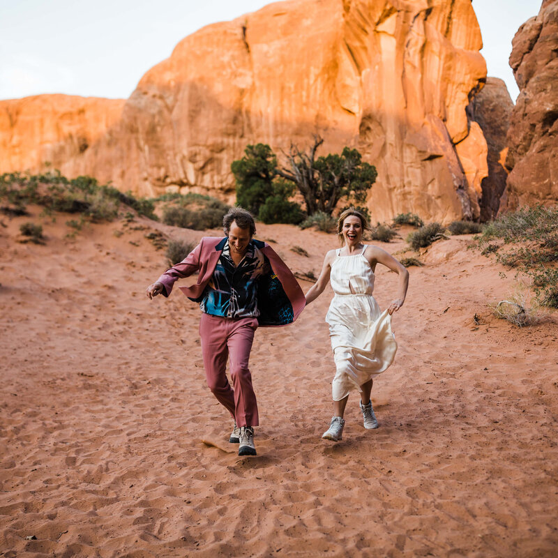 Couple runs through the Moab desert