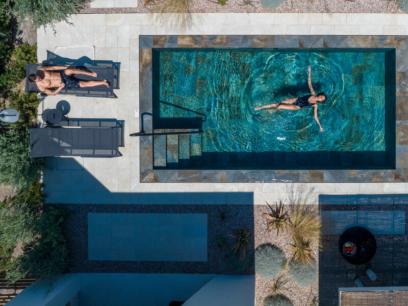 Waterstone - NOŪS Santorini - Santorini - Luxury Boutique Hotel - NOŪS Santorini-Pool Bungalow Exterior Drone