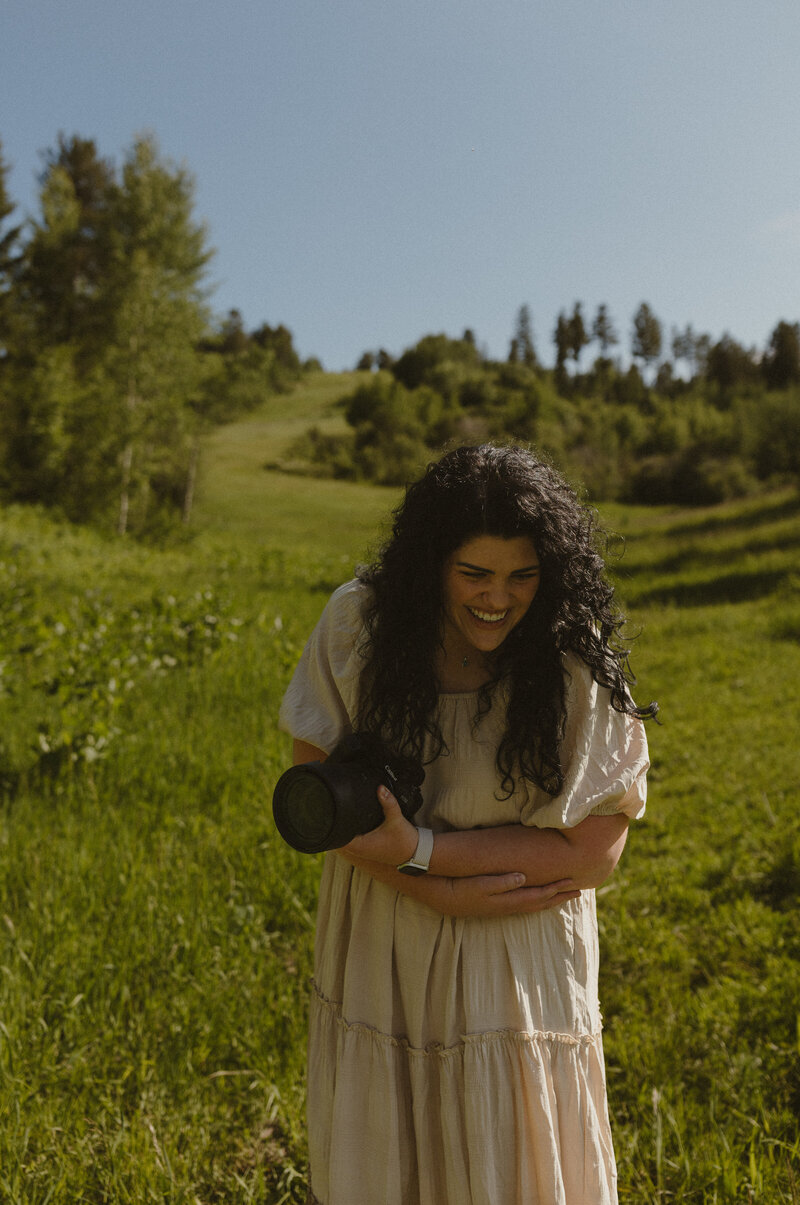 Brigette and Michael are swinging their daughter Isabella towards the camera, all smiling.
