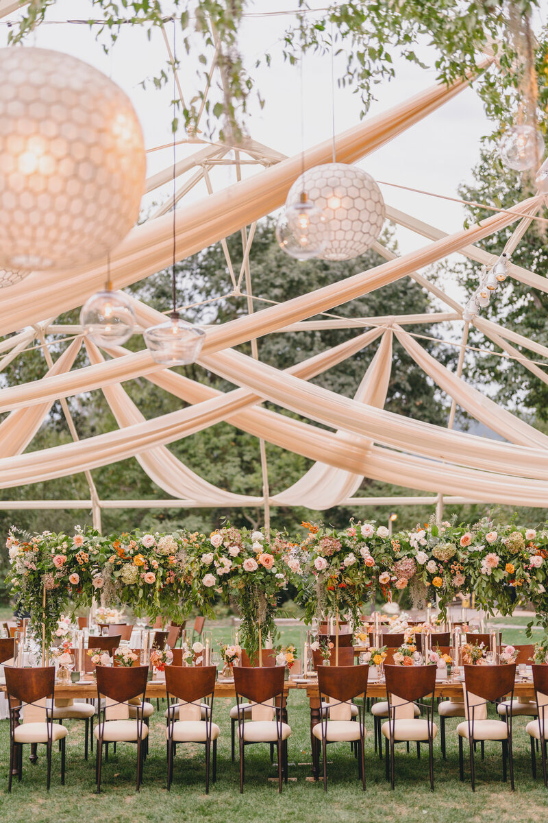 Arianna and Josh's wedding reception area. Discover Bliss Productions—a premier full-service wedding and event design company based in Laguna Beach, California. Every project we design reflects our passion for artistry and precision, turning visions into bespoke celebrations that leave a lasting impression. With decades of combined expertise in event planning, interior design, and branding, we transform every detail into an unforgettable experience that captures the unique vision and style of our clients.
