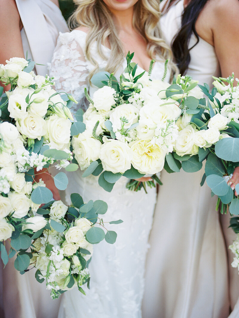 Film photo of white floral bridal and bridesmaids bouquets in Fayetteville, Arkansas