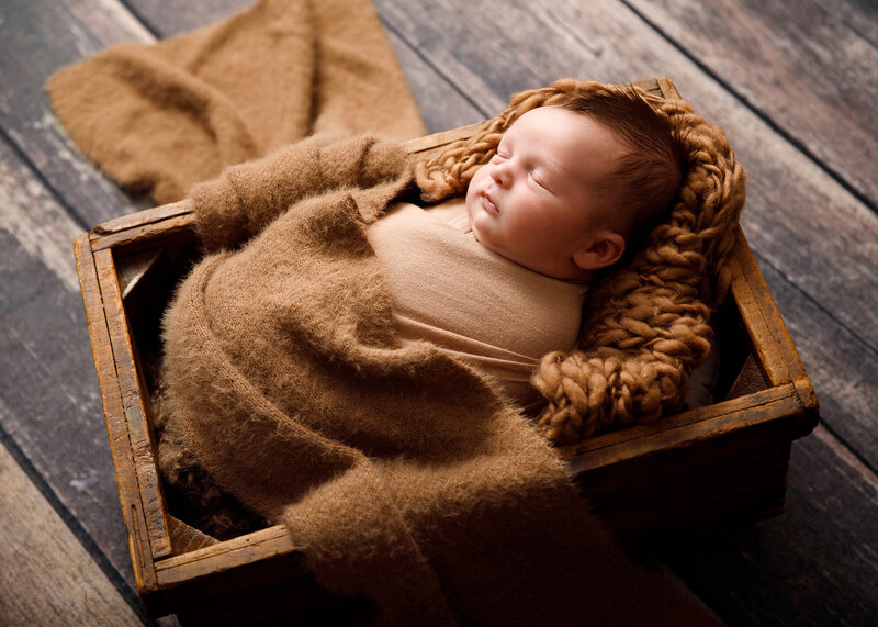 Newborn in Wooden Box