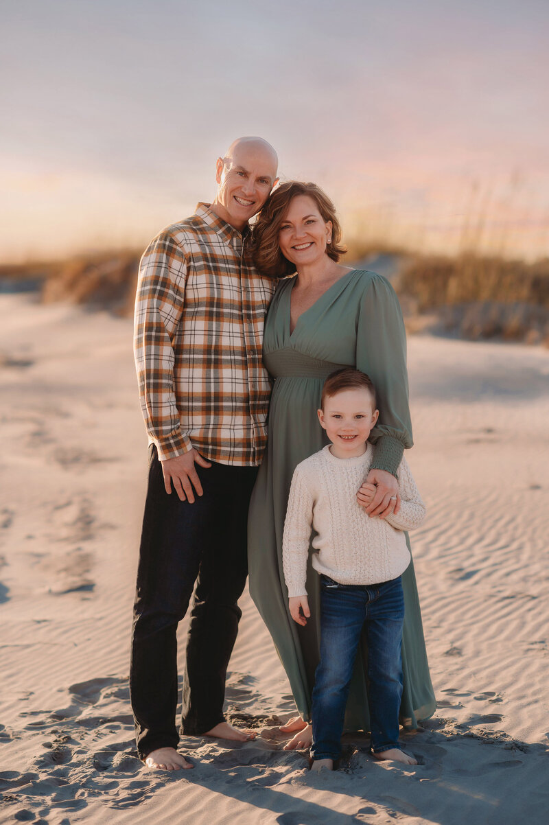 Family embraces during Family Portrait Session on Kiawah Island.