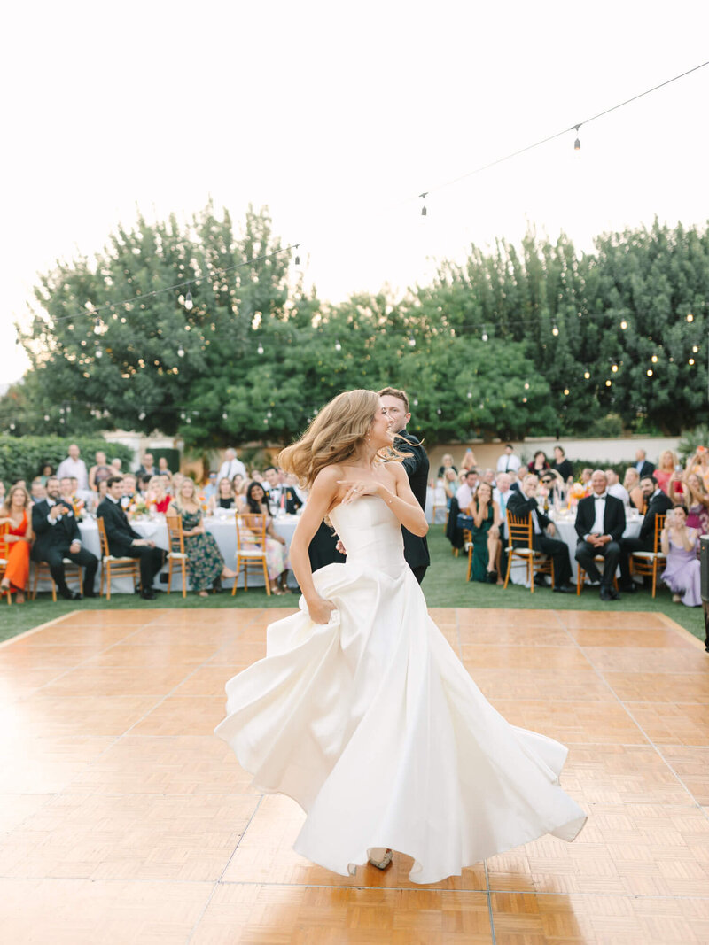 wedding photography of bride and groom having first dance during reception at Tommy Bahamas Resort Indian Wells