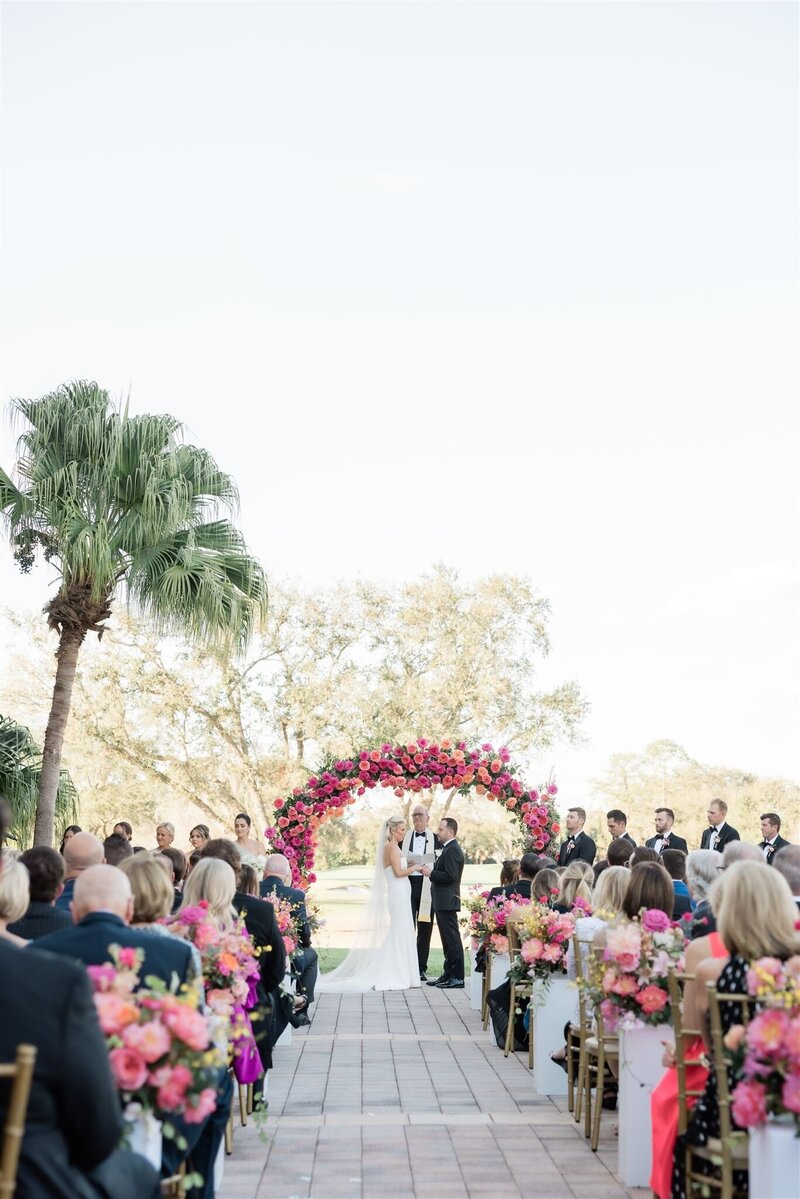 wedding ceremony at the country club of orlando by orlando wedding photographer
