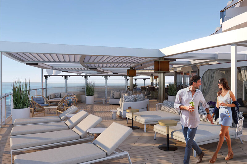 Couple enjoying cocktails on the Norwegian Aqua