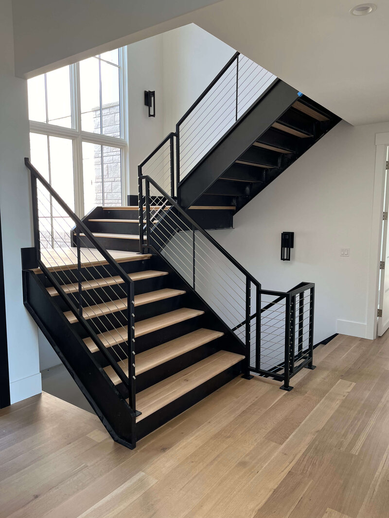 Custom industrial metal staircase built by Ace Welding in Traverse City