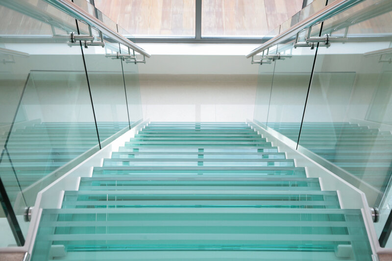Sleek minimal modern glass residential railing