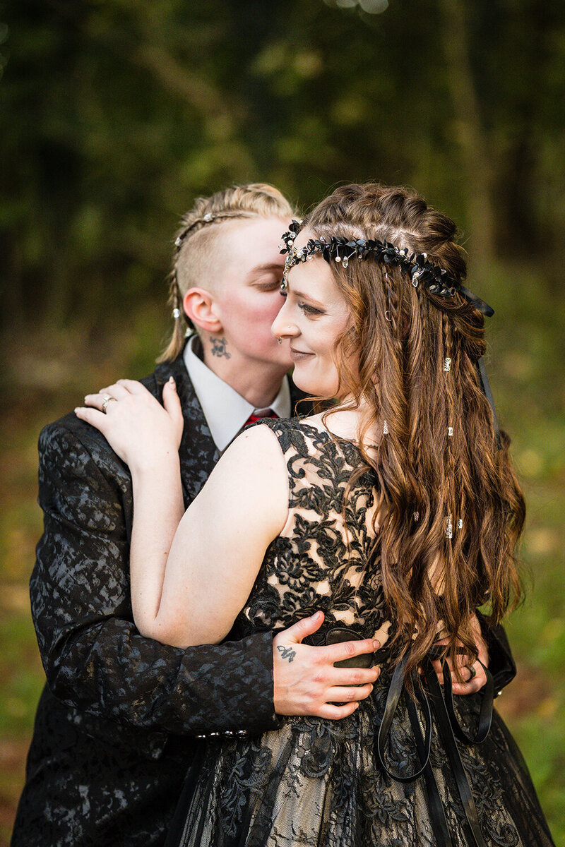 A queer couple embraces on their elopement wedding day in Roanoke.