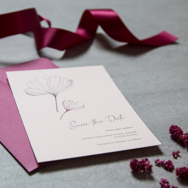 Pink elegant save the date card with ginkgo design