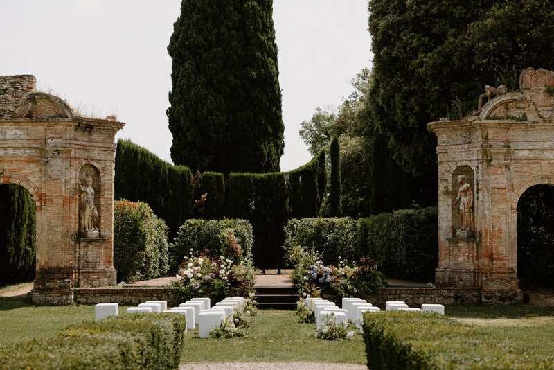 A small wedding ceremony set up in a garden 