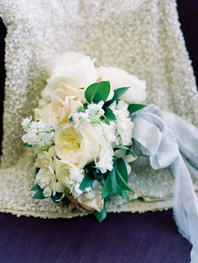 Bride's Reception Dress and White Floral Bouquet