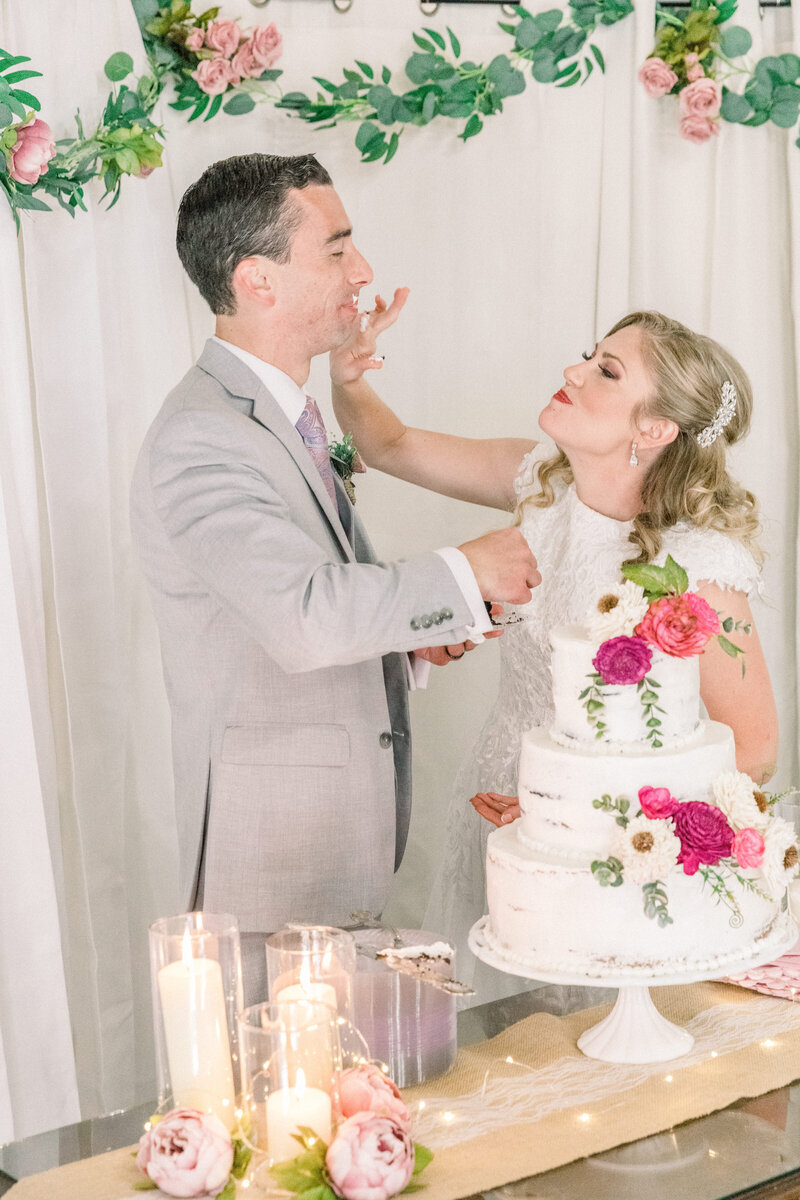 feeding wedding cake portrait 