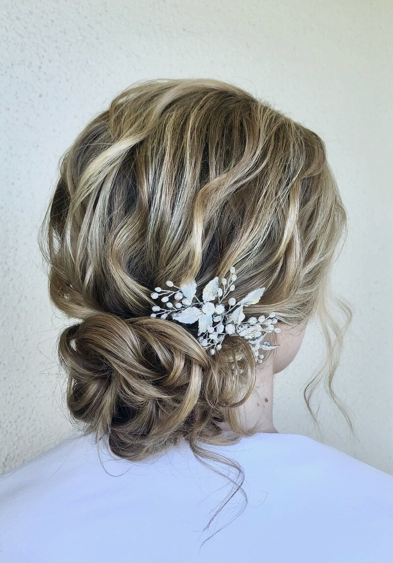 bride with blonde hair with loose updo