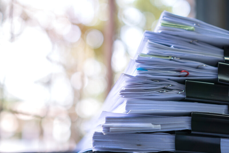 image showing a stack of tax documents