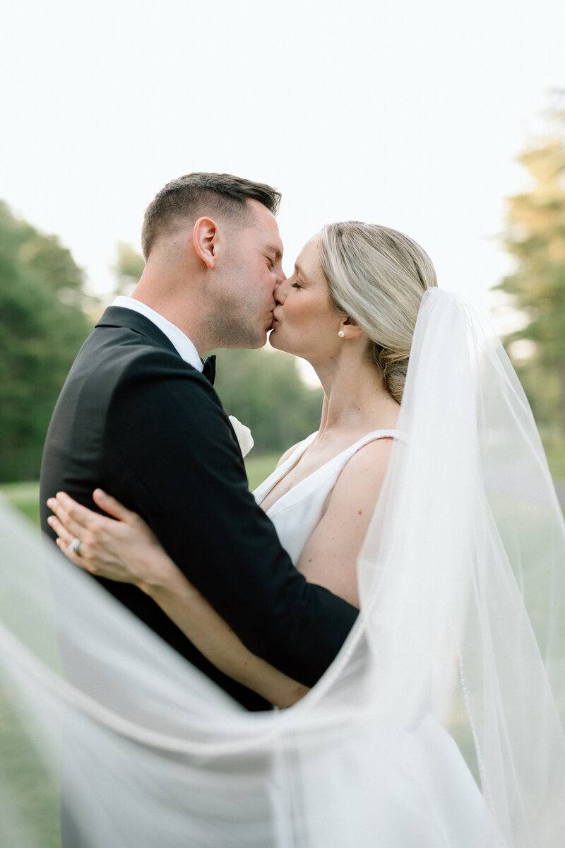 Bride and groom walk up memorial steps at their DC wedding