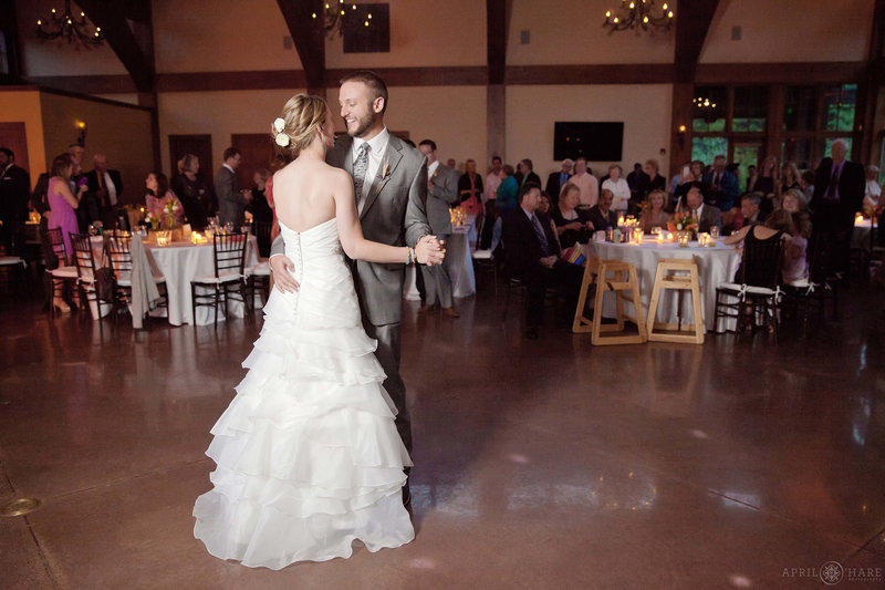 Couple dance their first dance inside the Donovan Pavilion in Vail Colorado