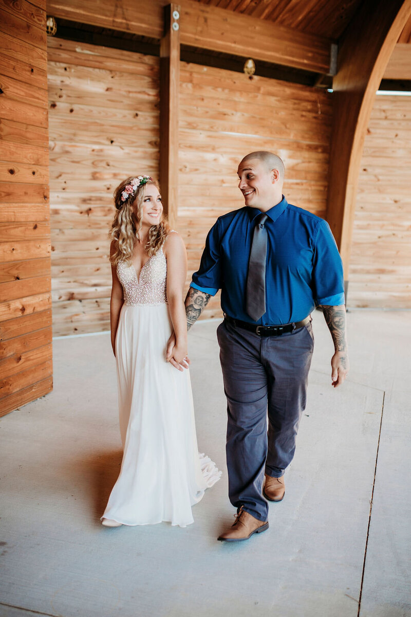 Couple walking down the aisle after saying “I do” in suburban Chicago