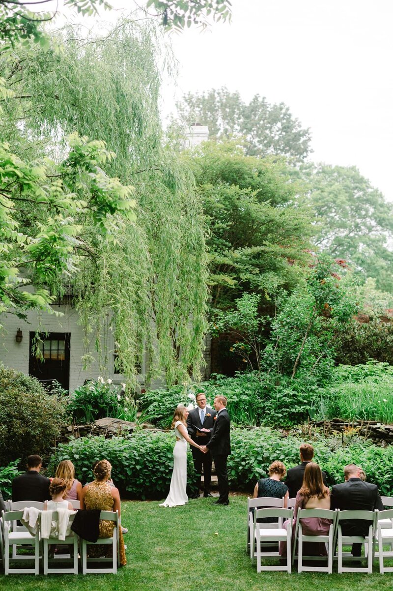 Bride and groom and officiant at alter of microwedding at Clifton Inn Charlottesville wedding