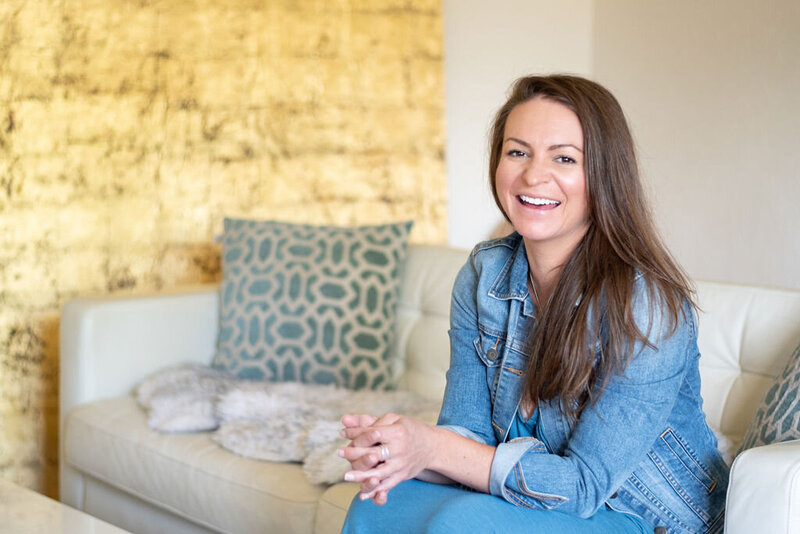 A portrait of Sarah Schweppe, an expert in confidence building and somatic tools for transformation, providing coaching services for divorced women