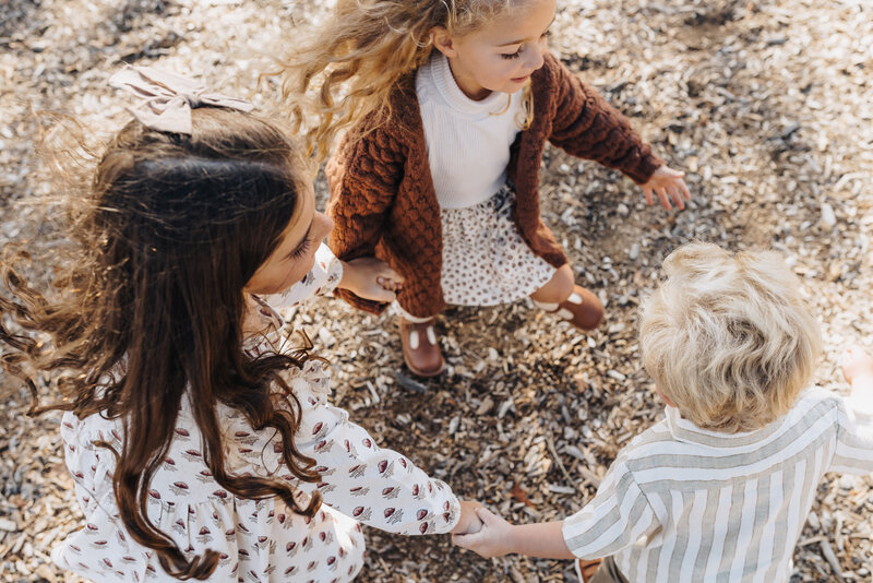 Three Siblings Dance Together