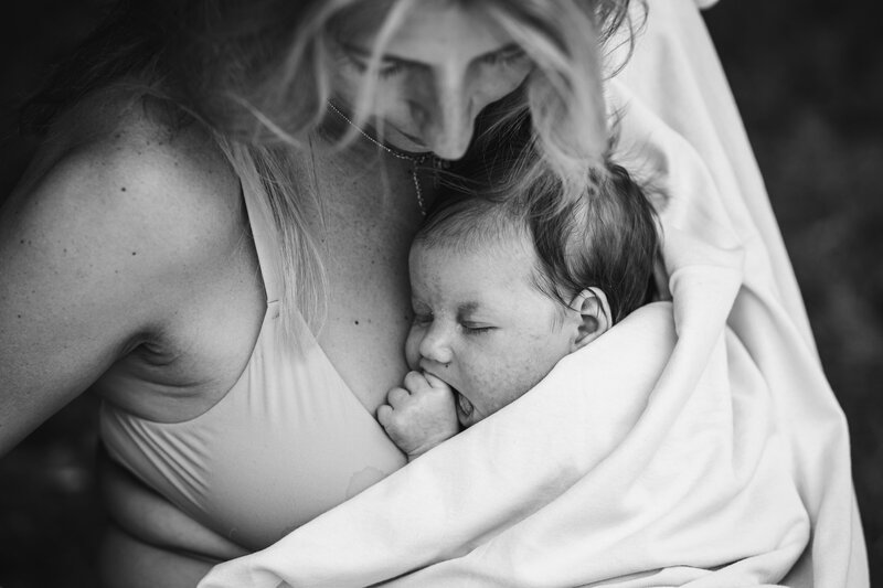 Newborn sleeping on mother's chest