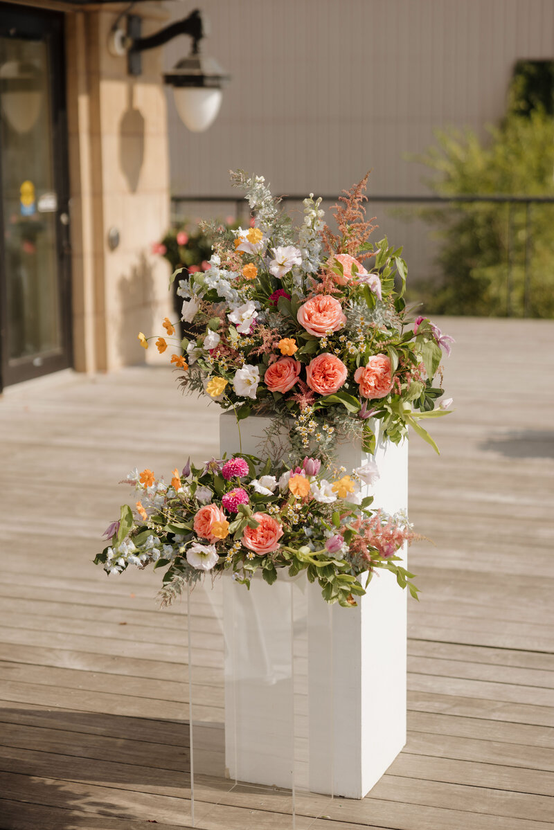 A romantic display of wedding florals, featuring delicate roses and peonies, beautifully captured for an editorial-style destination wedding.
