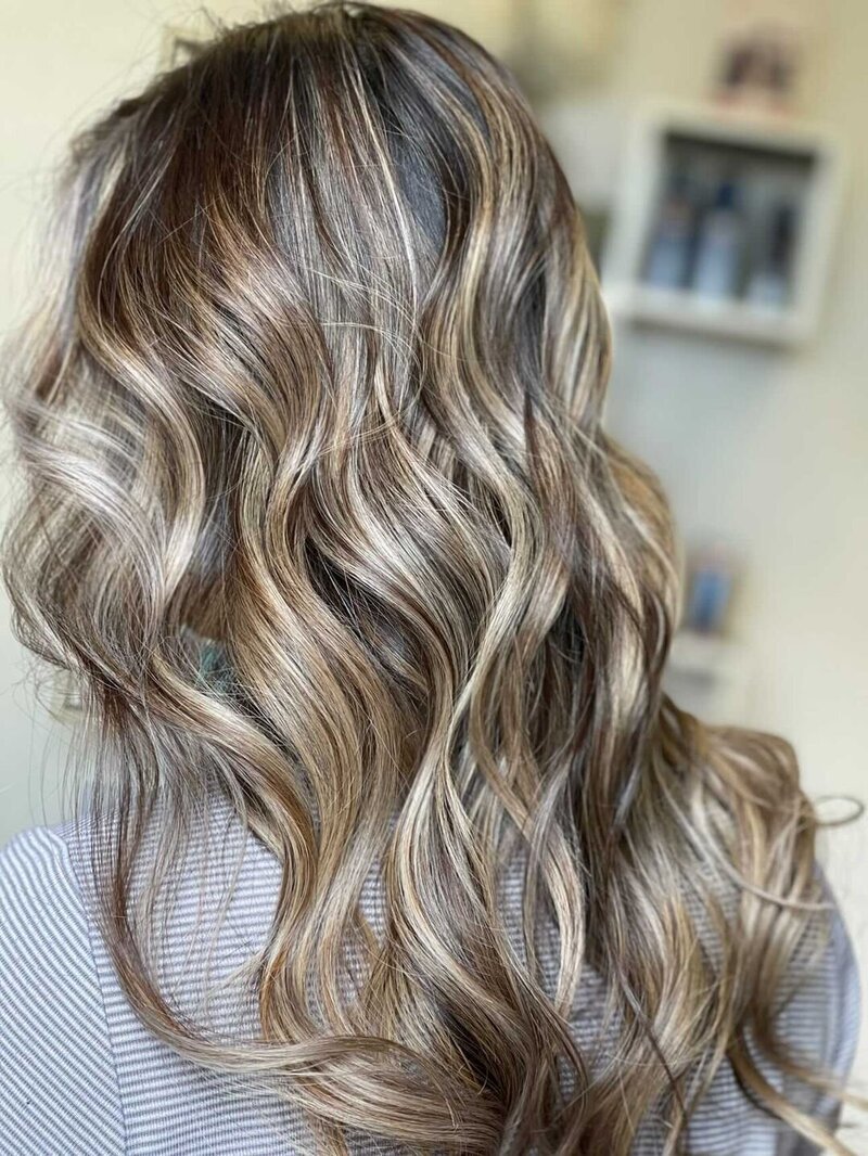 medium blonde with highlights and waves