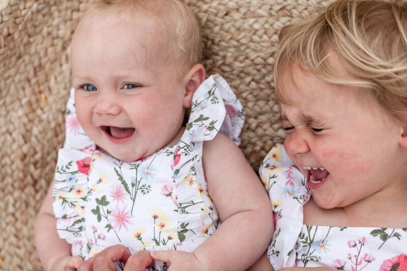 newborn baby boy having a wide yawn