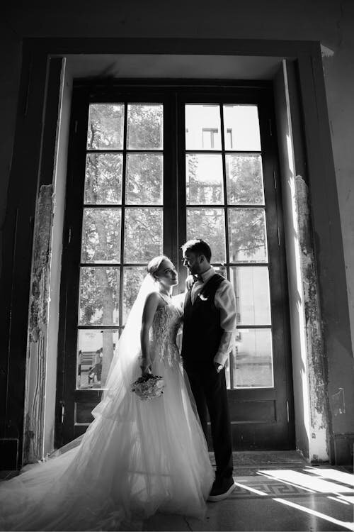 free-photo-of-elegant-black-and-white-wedding-portrait-by-window