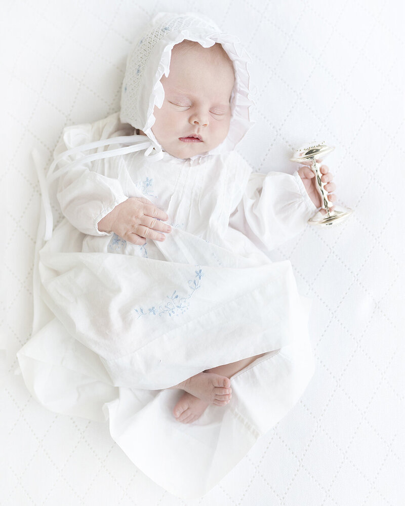 newborn photographed in st simons island in a grandmillenial style feltman brothers gown