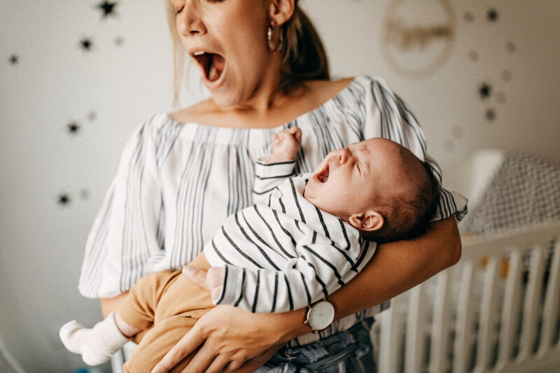 Tired mom and baby