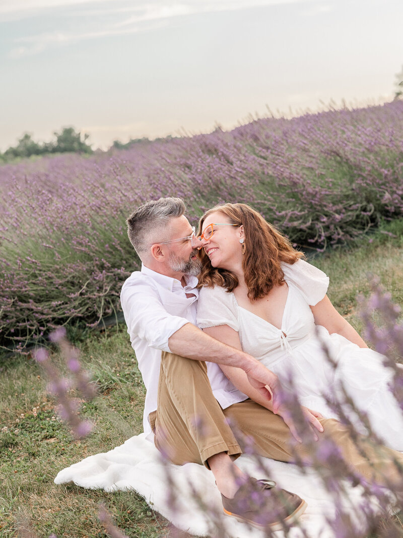 Portrait of a couple about to kiss in a lavender field