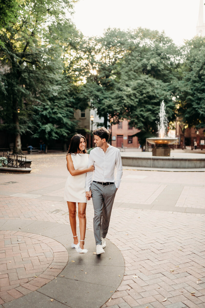 With the charm of Boston’s North End all around them, this couple embraces, creating a picture-perfect engagement moment in the heart of the city.