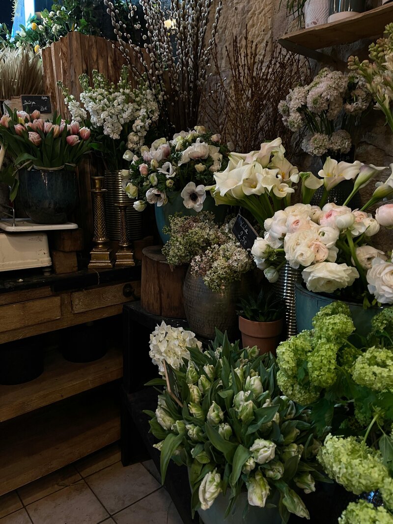 Assorted buckets of flowers