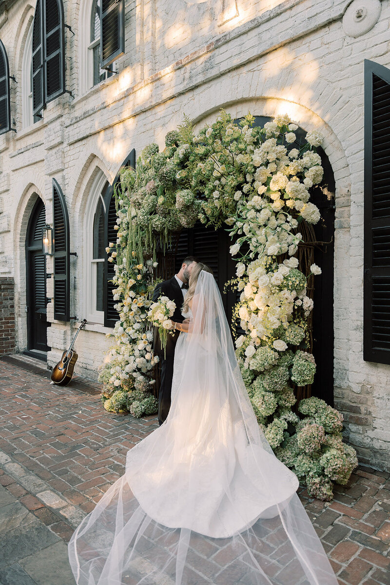 Bride and groom walk up memorial steps at their DC wedding