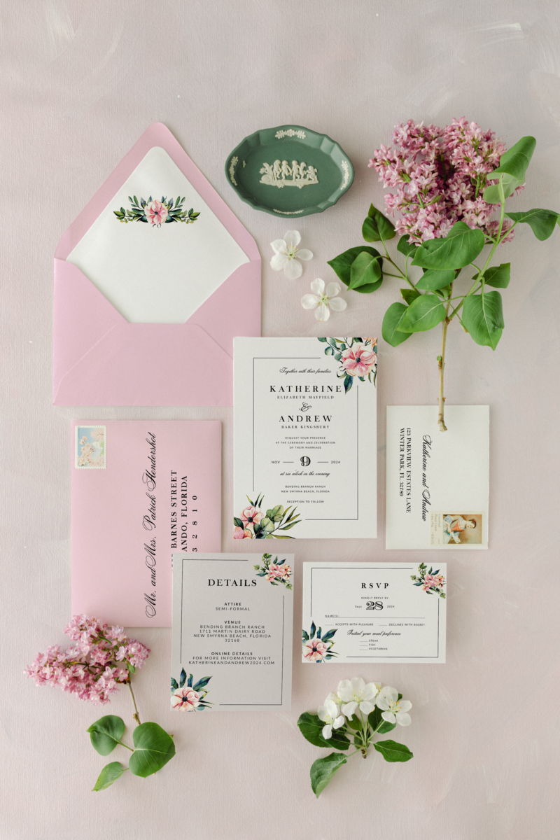 pink and green florals with black borders and pink envelopes