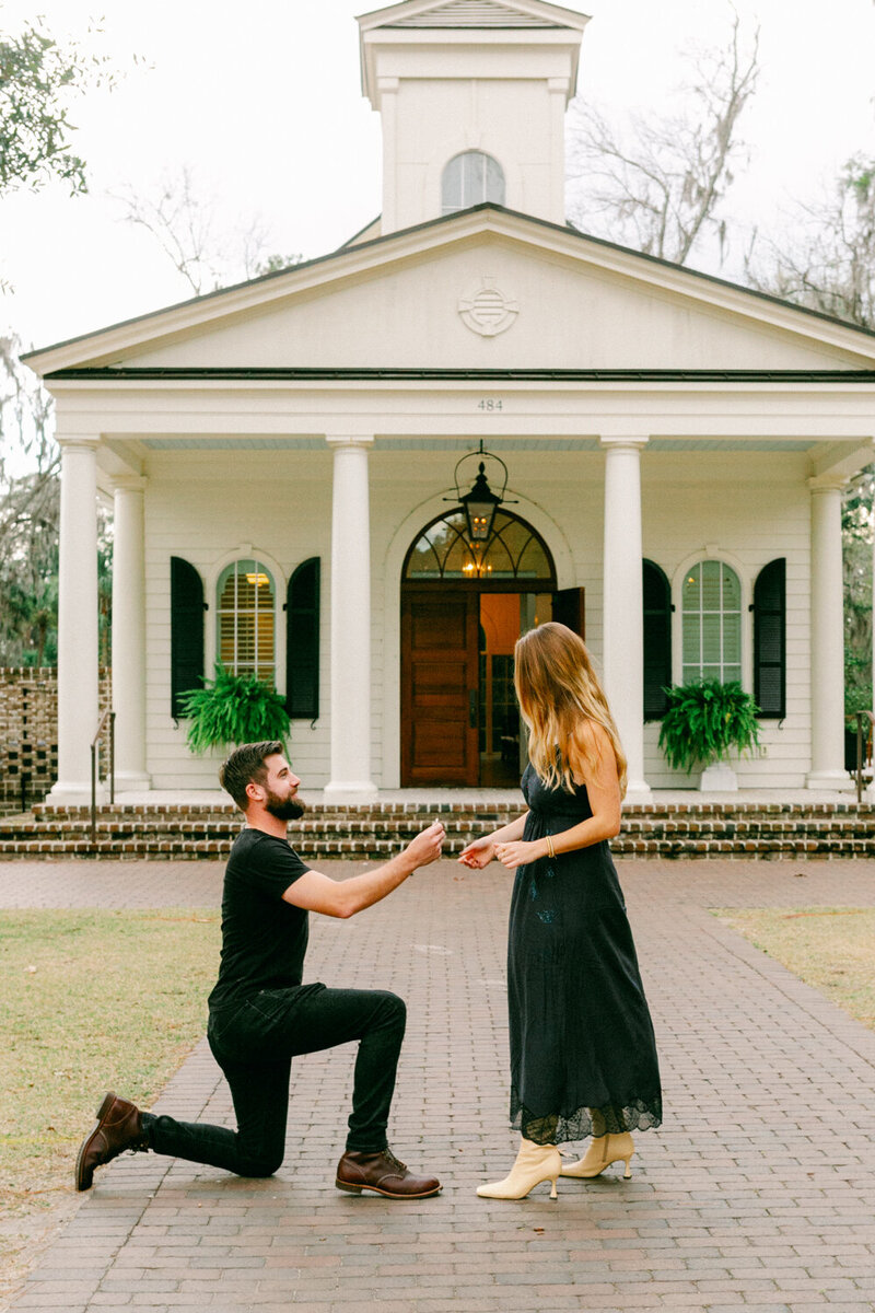 Candid Marriage Proposal in Palmetto Bluff in front of the chapel