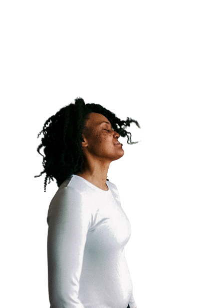 Jennifer Sterling, Dance/Movement Therapist, gently embracing herself with closed eyes, embodying self-compassion and somatic healing for Strong Black Women.