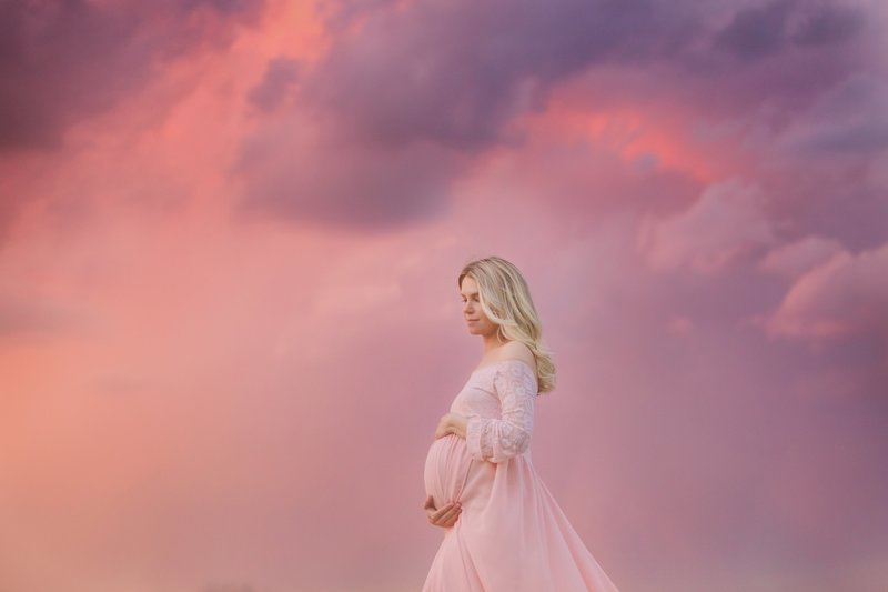 Stunning pregnancy  pictures on a warm  summer night with a gorgeous sunset in Fort Collins.