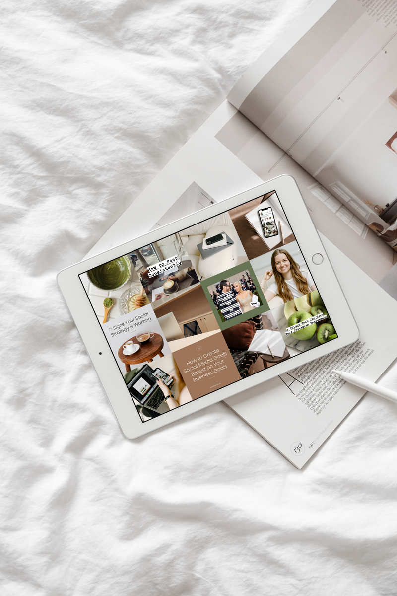 Ipad with Instagram Grid showing, on top of magazine, on top of bed with white sheets