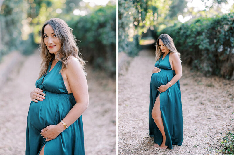 A mother to be wearing an emerald green dress on a trail in Montecito