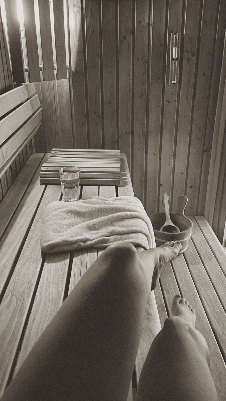 Shot of legs on the bench of Sauna 