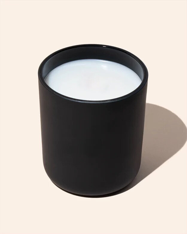 Noura Blanc Aura Candle in Black Large 12oz on Flat Lay