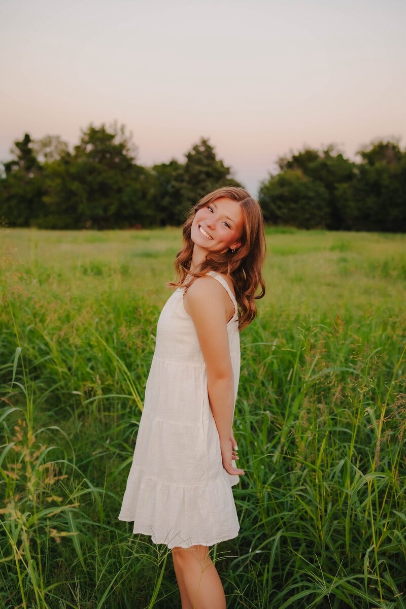 sydney chapman posing in field