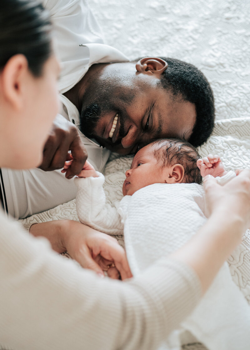 toddler boy on bed with no shirt