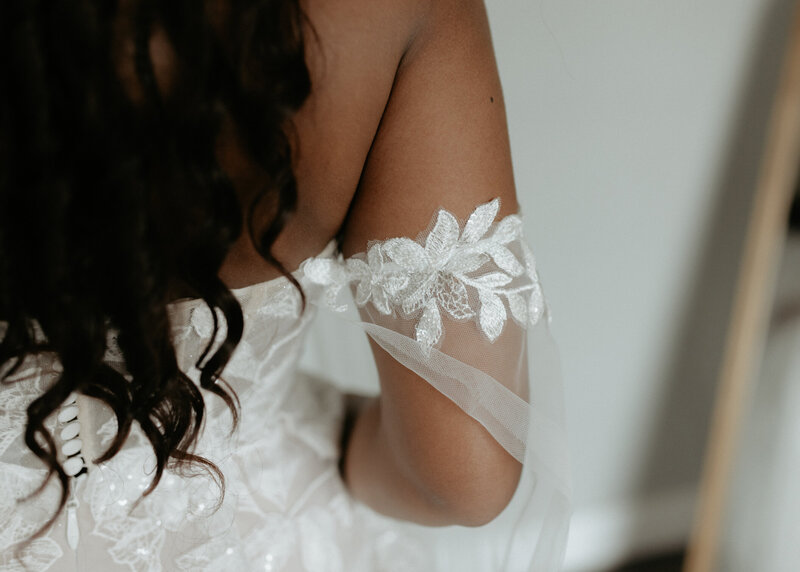 Lace details from a wedding dress.